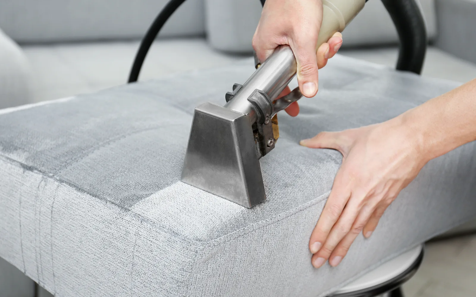 Vacuuming upholstery from the Affordable Carpet Cleaning source site