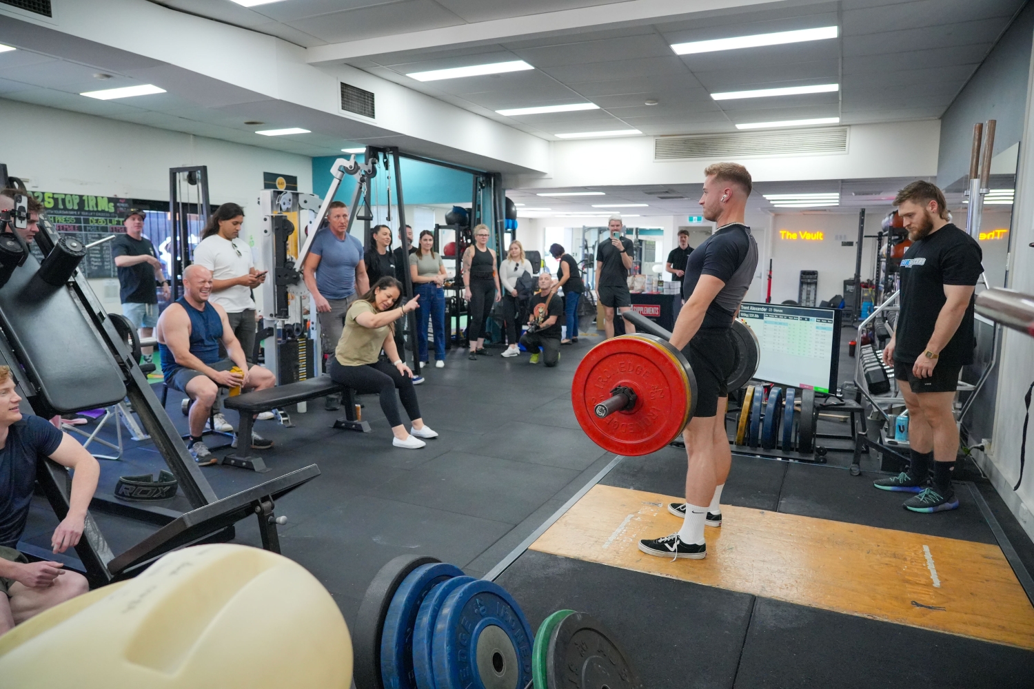 Members watching a deadlift