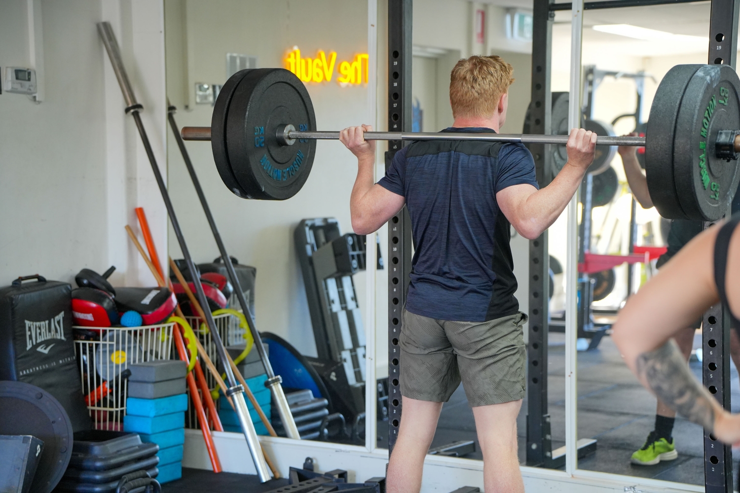 A member squatting in the rack