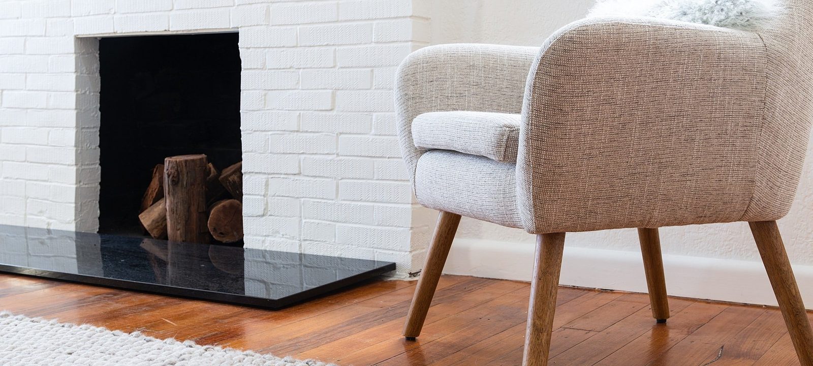 Freshly steam-cleaned carpet and armchair in a Brisbane home by Andrew Pook's Carpet Cleaning Service