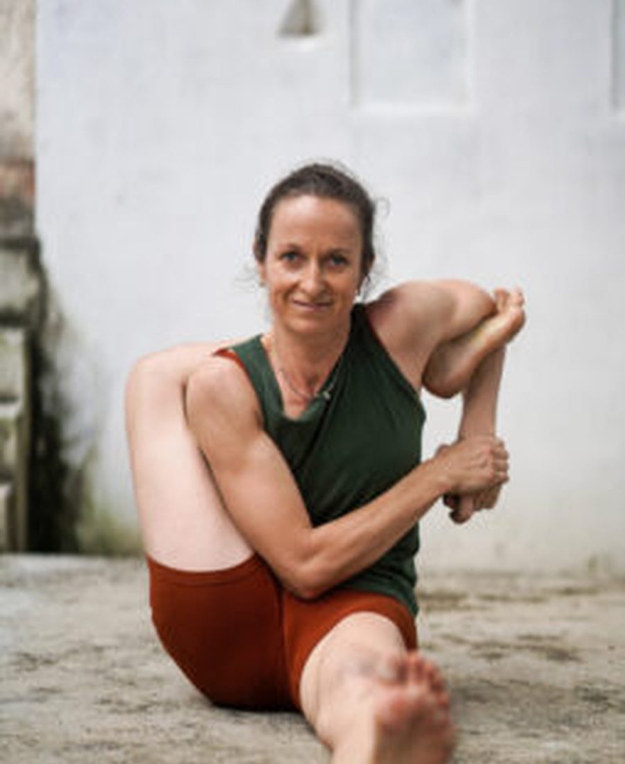 Ash Hope practicing Ashtanga Yoga
