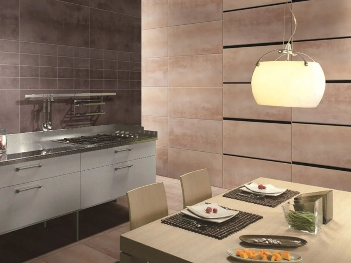 Tiled kitchen and dining area with feature wall