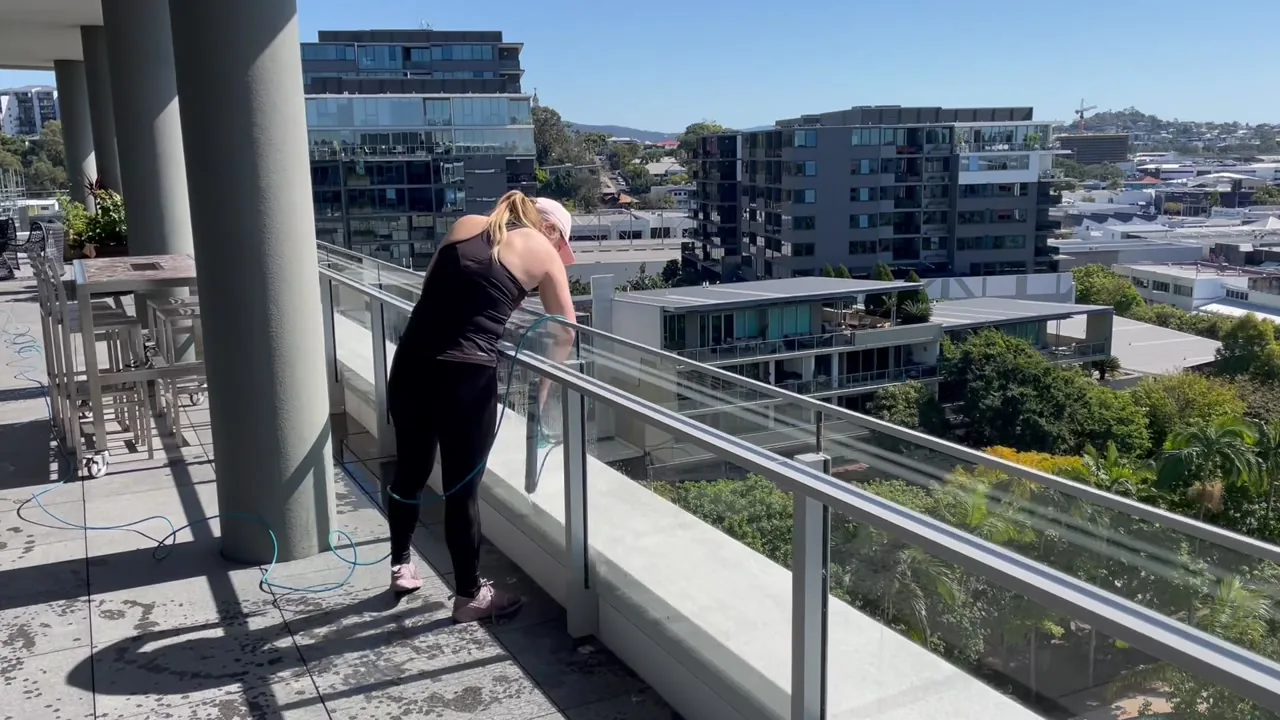Window cleaning on a Bulimba balcony