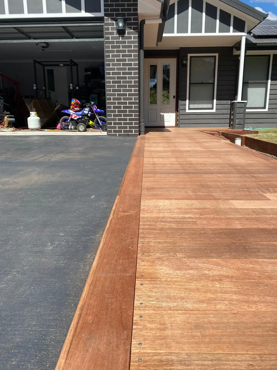 Hardwood front entry deck and walkway built by C3L Carpentry & Joinery