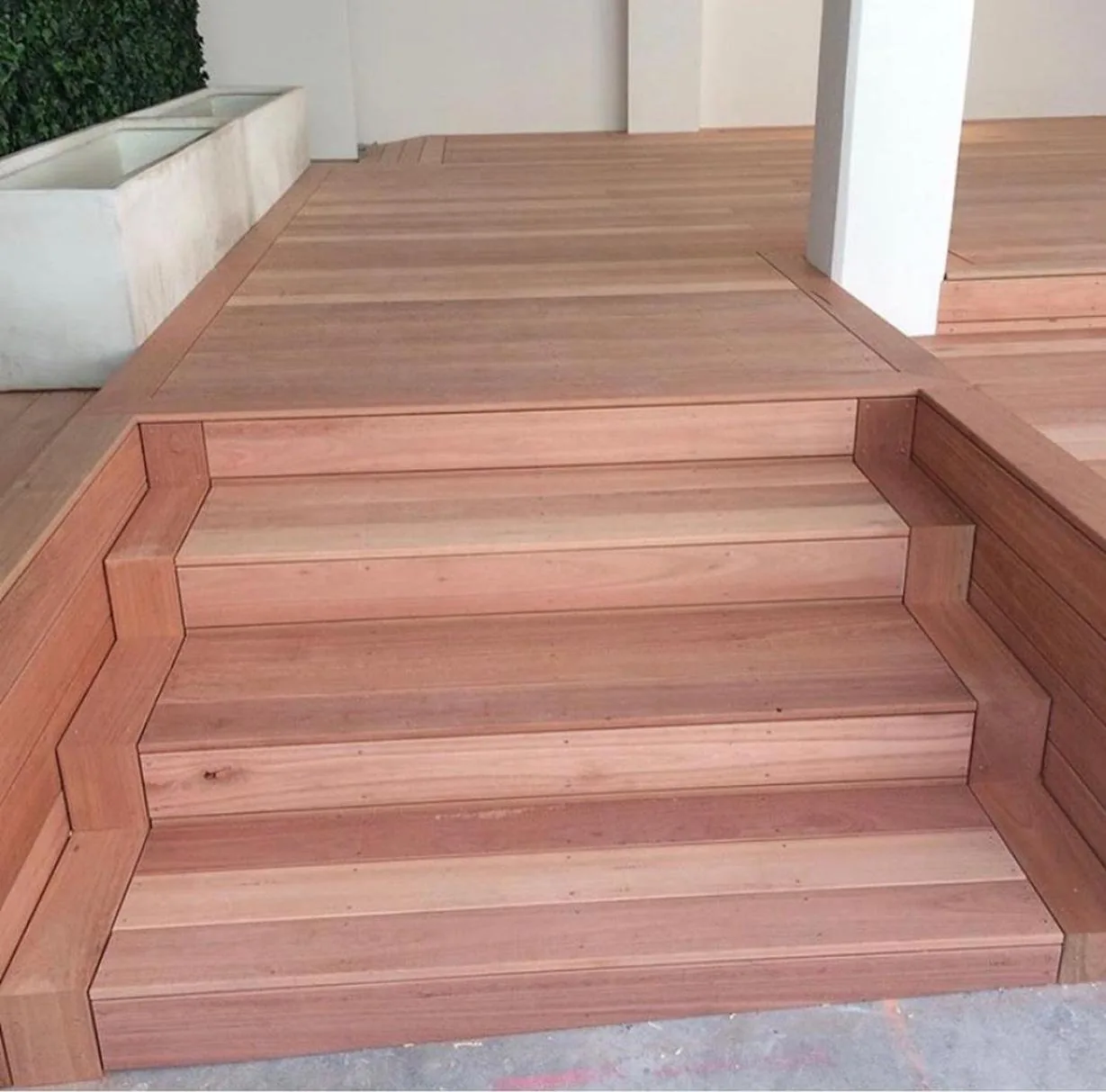 Custom timber deck stairs with planter detail by C3L Carpentry & Joinery