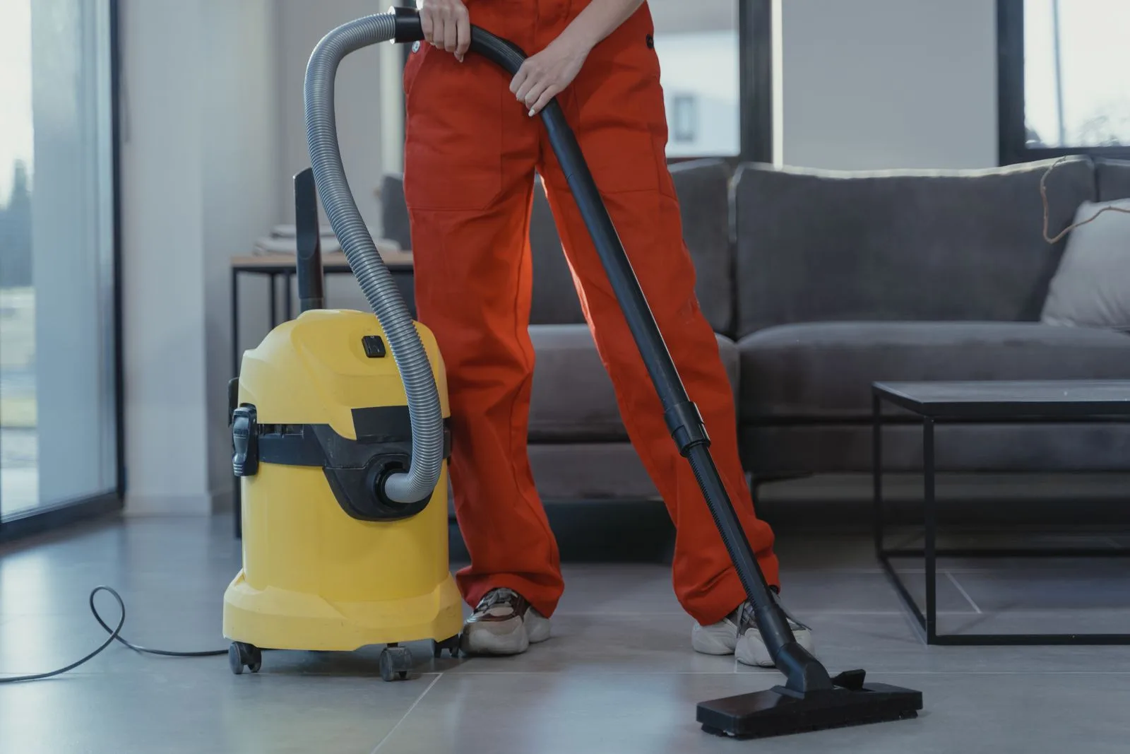 Local cleaning professional with equipment ready for a job