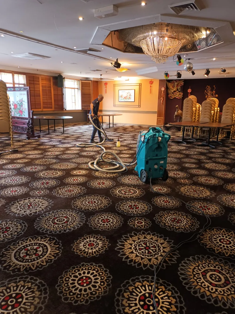 Clean Carpets Brisbane steam cleaning a venue carpet in Brisbane