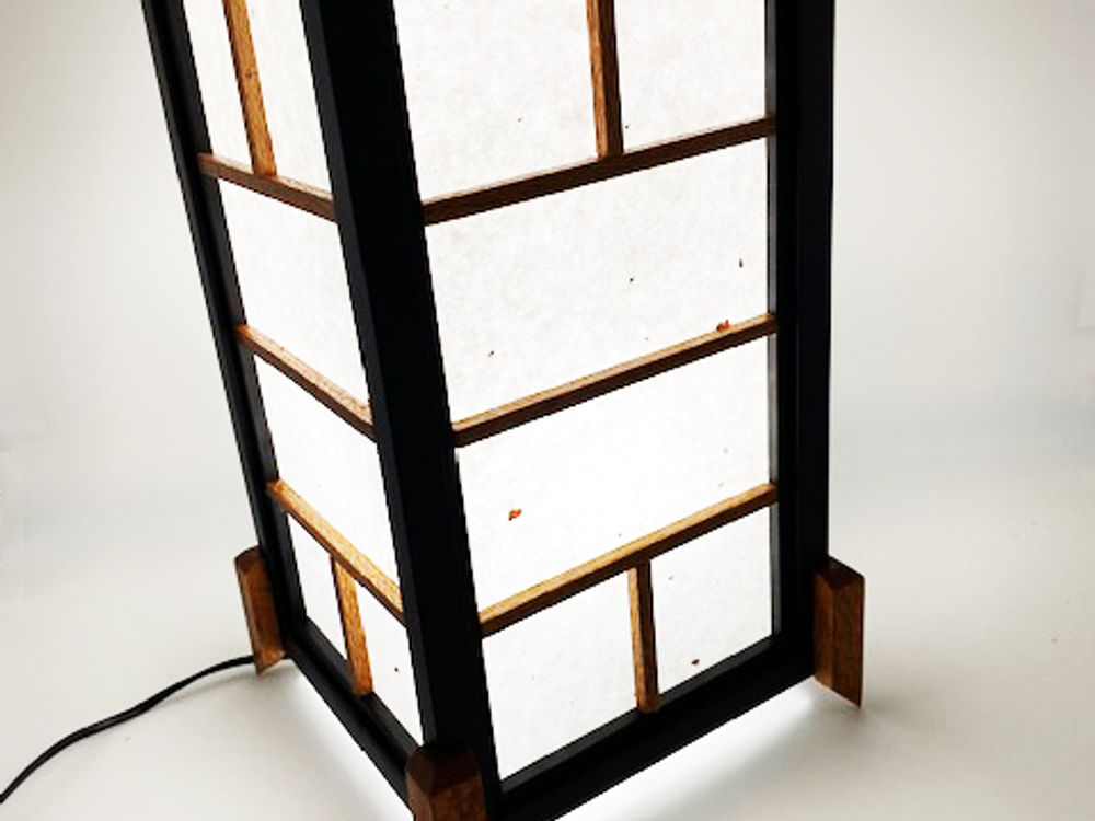 Japanese style timber lantern with paper screen and timber feet