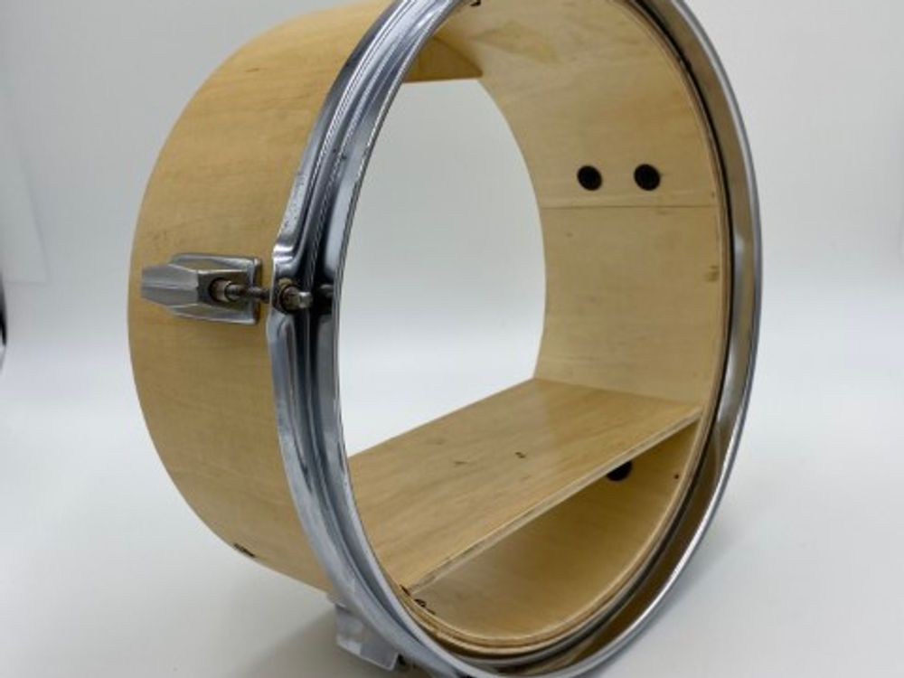 Drum turned wall shelf