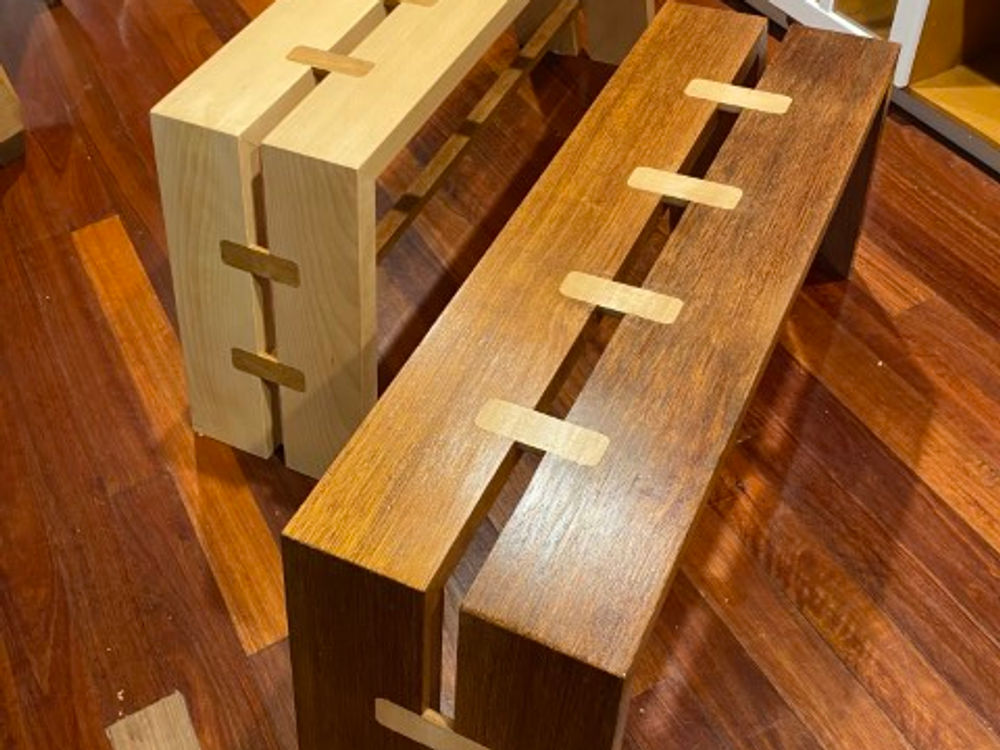 Timber benches with gap design.