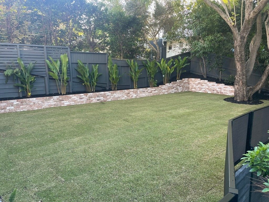 Turf lawn with rock garden border