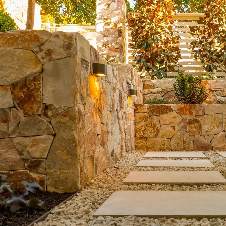 Stone steps and retaining wall in a sloping garden