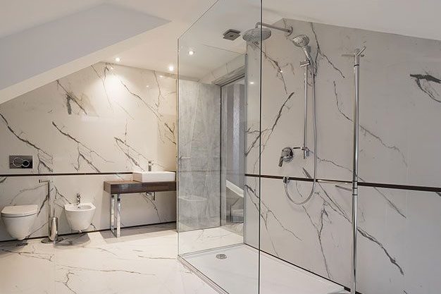 Modern tiled bathroom and shower repair finish