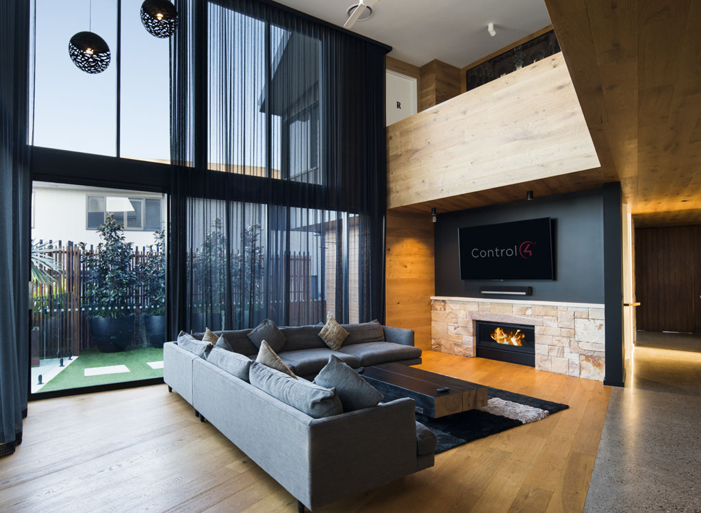 Lounge room with integrated lighting and AV — Forrest Electrical residential project