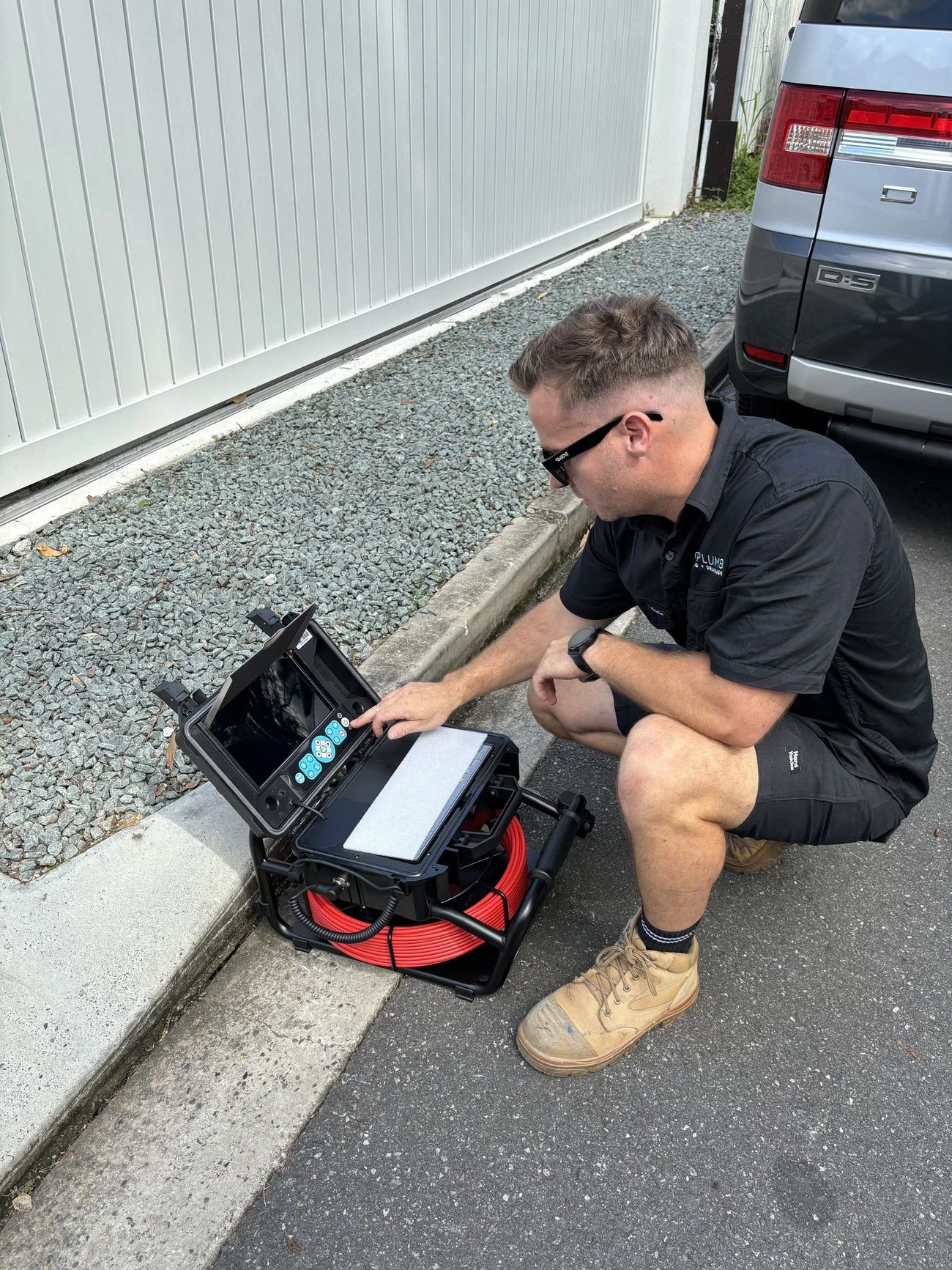 GEOPLUMB licensed plumber on the job in Brisbane