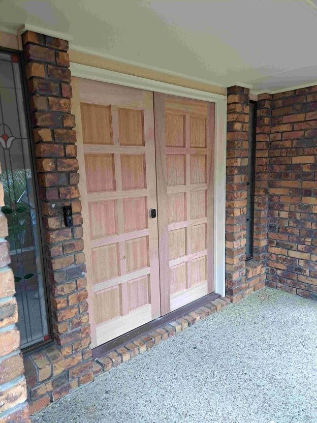 Installed external double timber doors — residential project