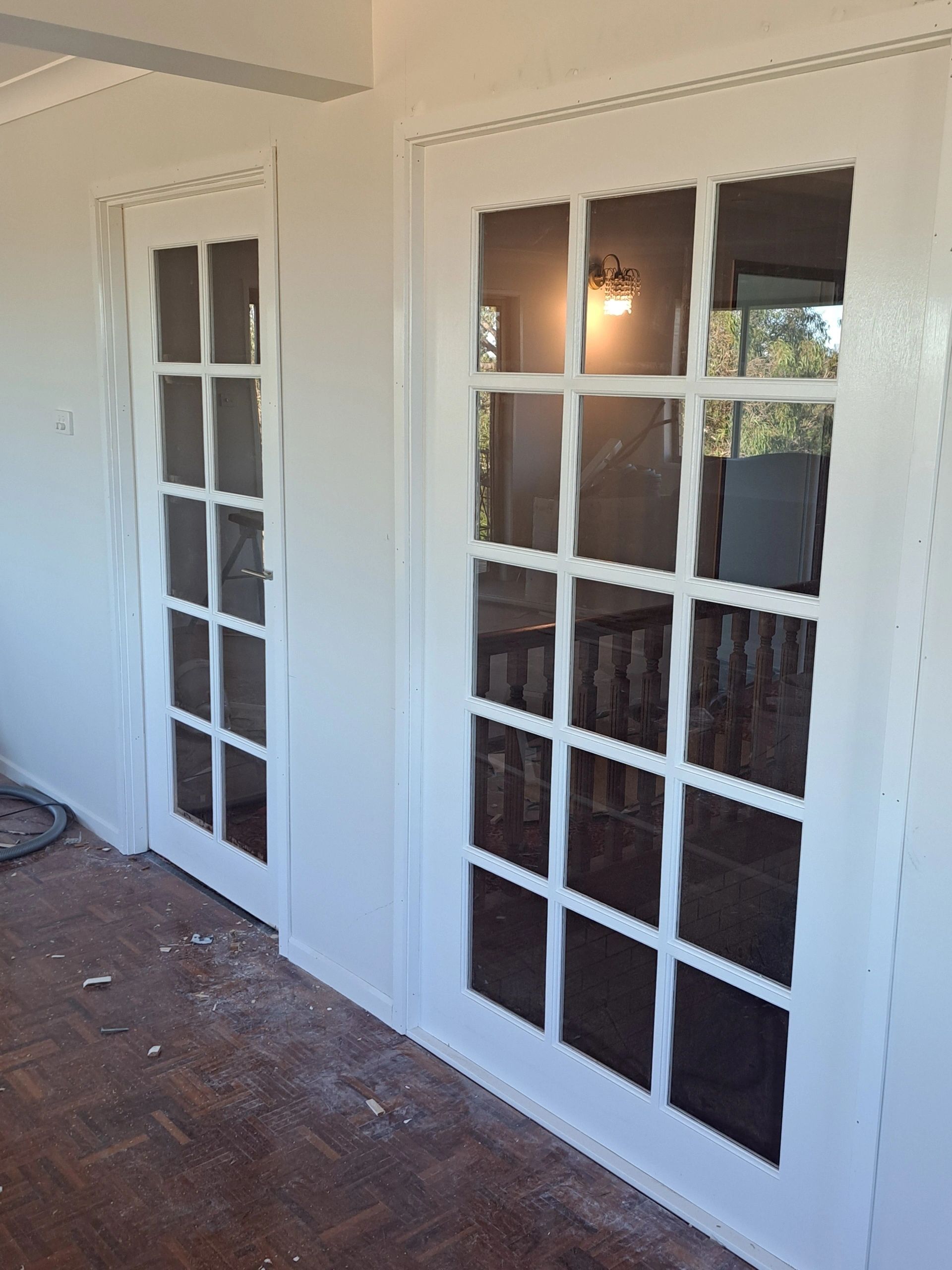 New timber door installation portrait view