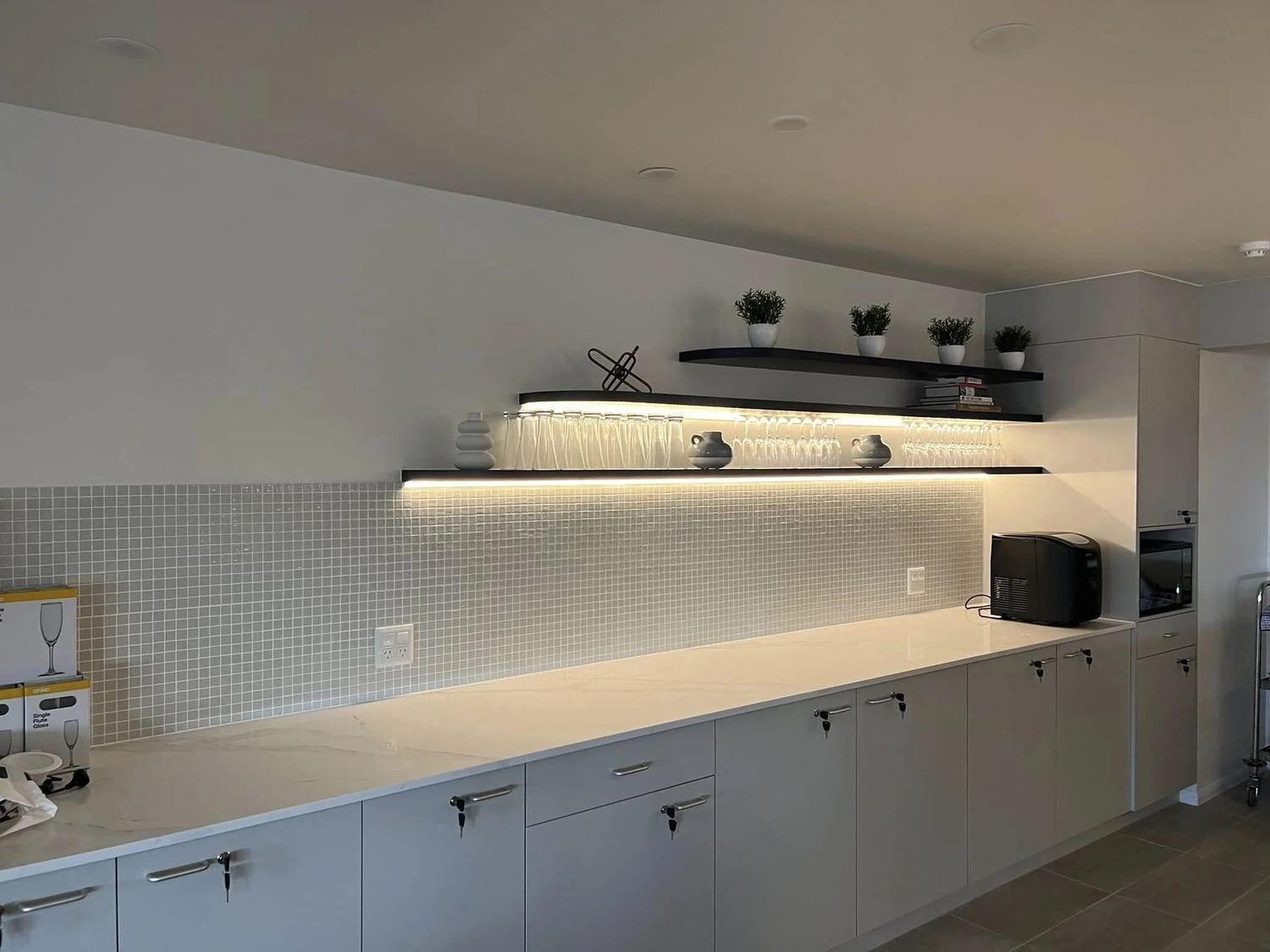 Energy-efficient LED shelf lighting installed by Gordon Electrical