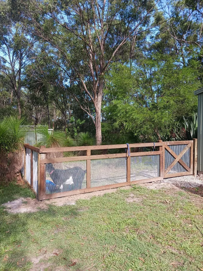 Low timber and mesh garden fence