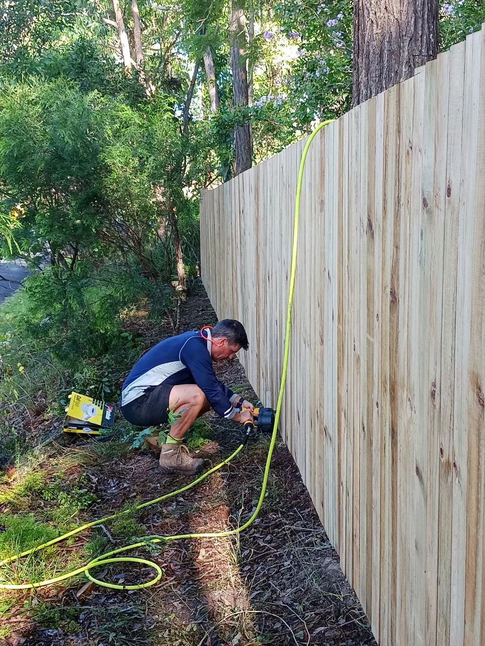 Building a new timber fence on a sloping block