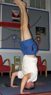 Alan in headstand during yoga practice