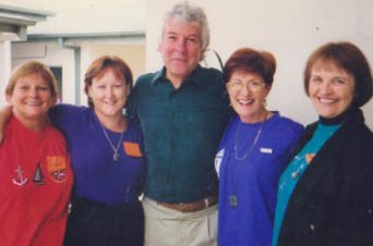 Lee with yoga colleagues and students