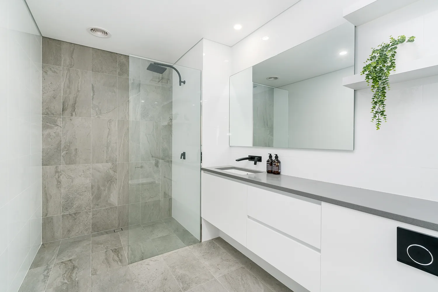 Modern grey and white bathroom with walk-in shower