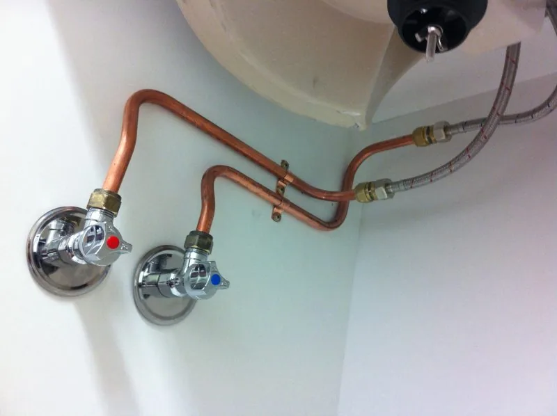 Copper pipework and chrome mixer valves — hot water connection