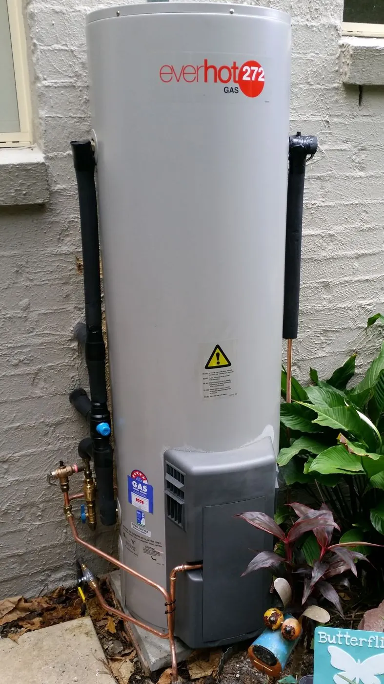 Installed gas hot water system beside a Brisbane home