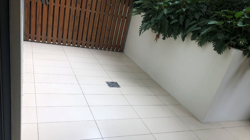 Tile cleaning before and after — Brisbane bathroom