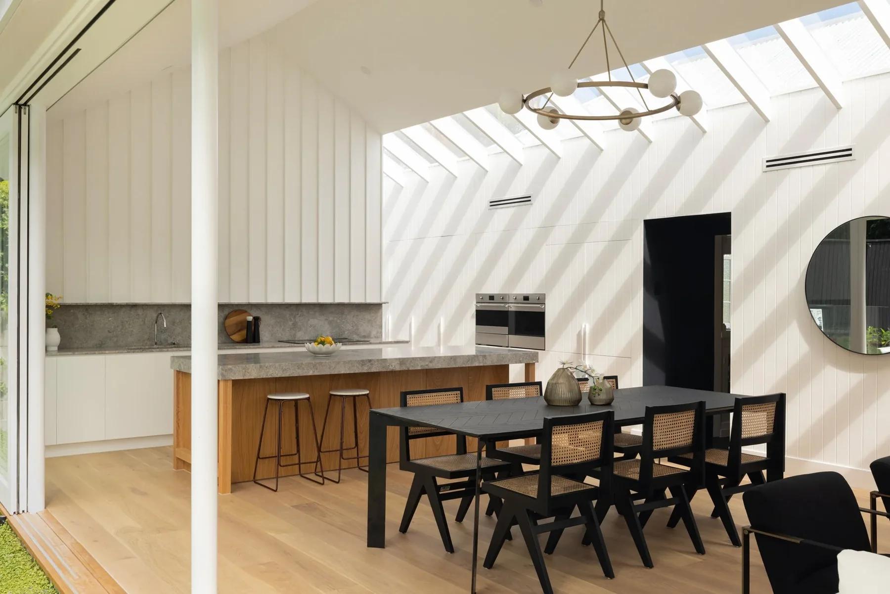 Kris & Co Painting prepared kitchen surface in Brisbane