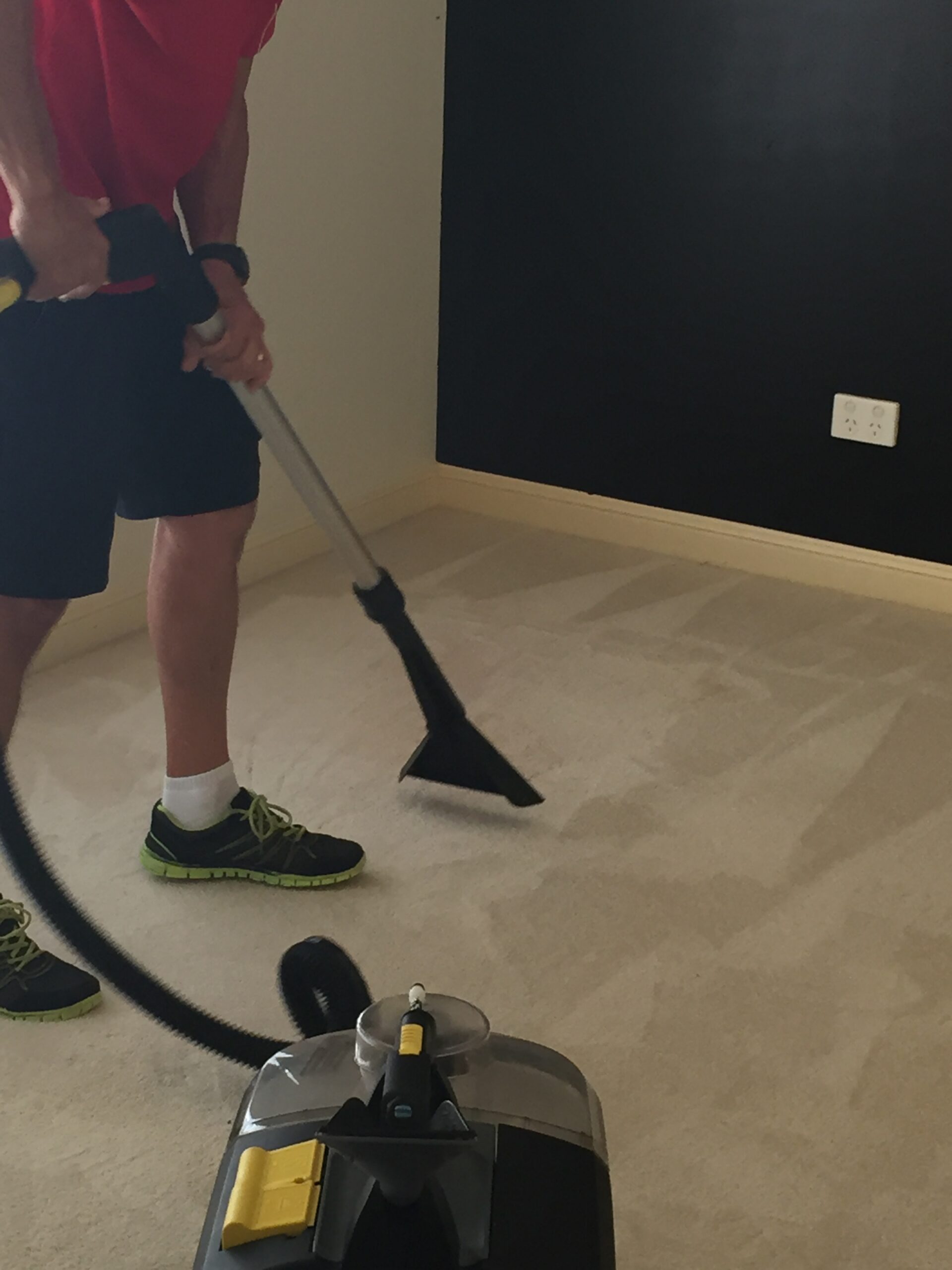 Gary Lang cleaning carpet with the Razorback extraction machine