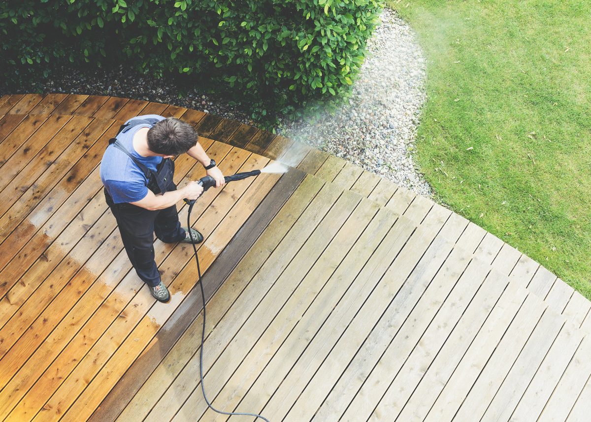 A tidy timber deck and garden area after a clean-up