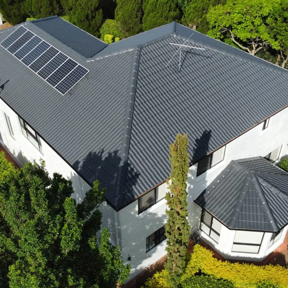 Aerial view of a charcoal restored roof in Brisbane