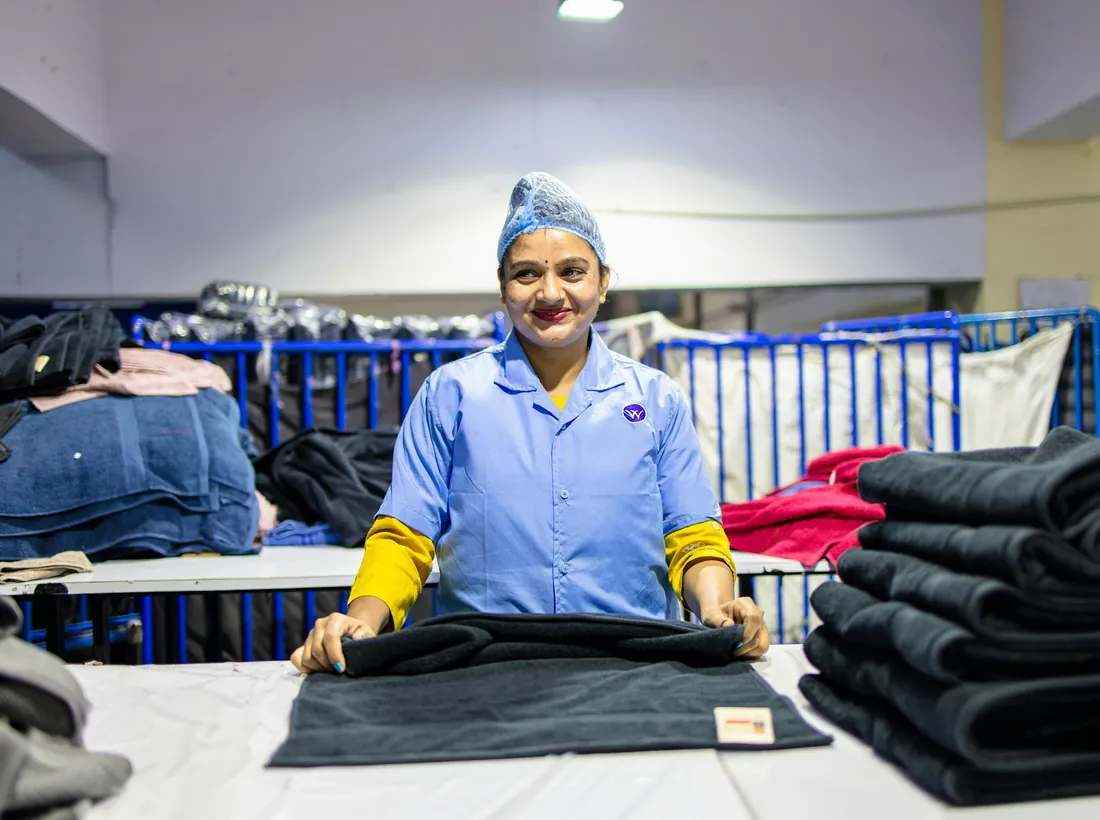 Maid Cleanerz preparing fresh linen for a short-stay turnover