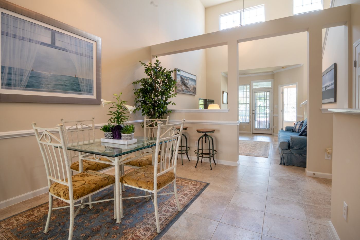 A calm, freshly cleaned open-plan living and dining room