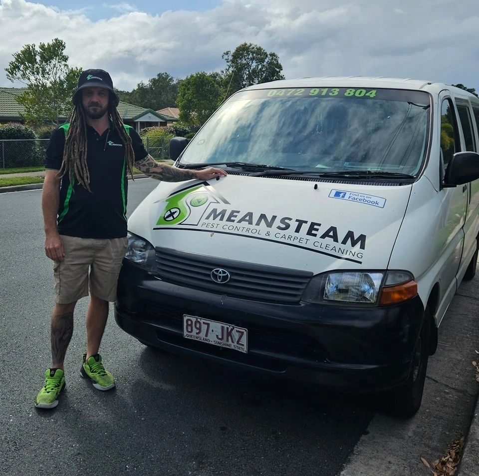 Elias from Meansteam beside the branded Meansteam service van on the Sunshine Coast