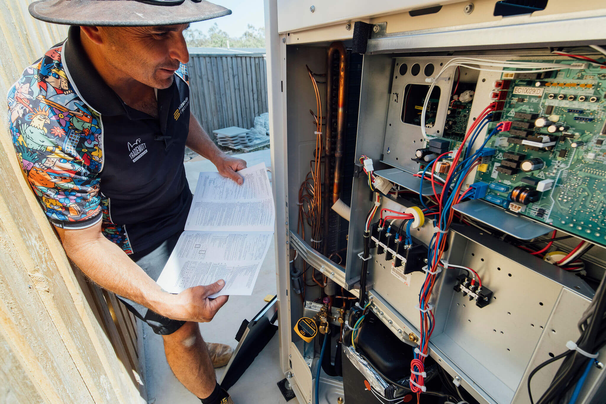 Miranda Electrical technician inspecting equipment