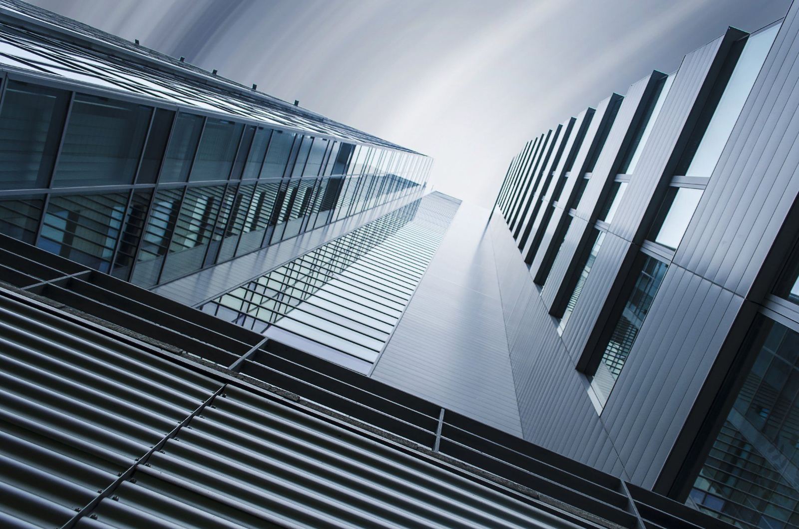 Modern glass office towers — architectural and structural drafting by PAEC Outsourcing Services
