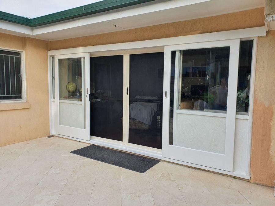 Restored white timber and glass doors