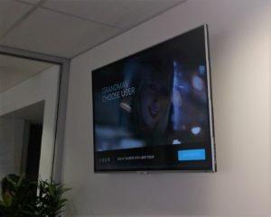 Large television mounted on a wall