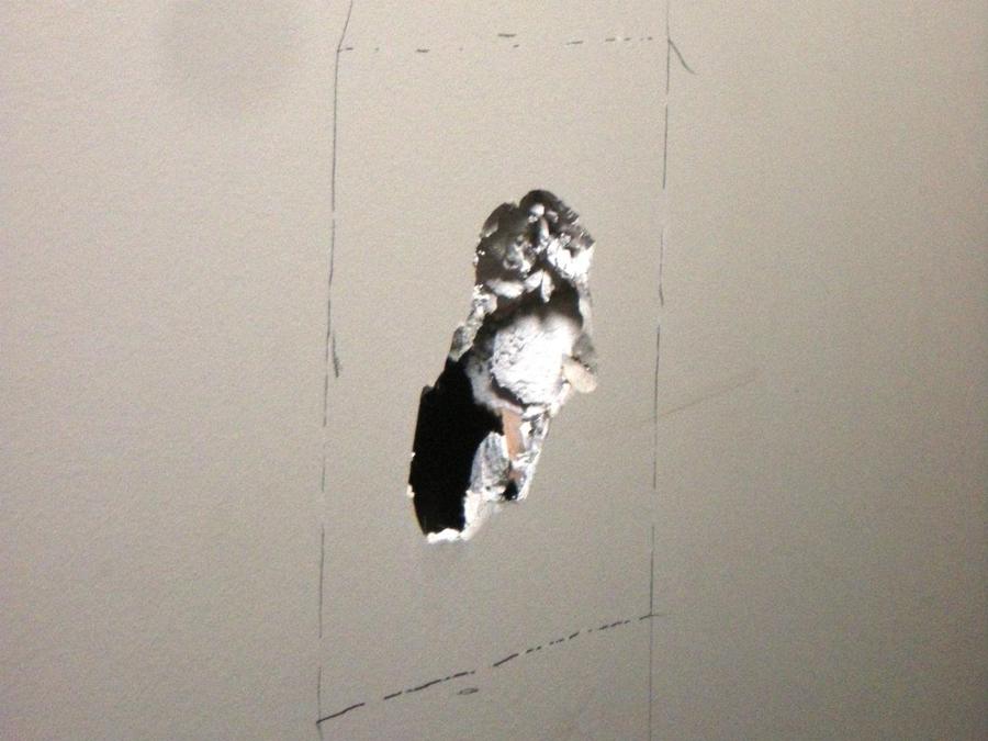 Wall repair before colour-matched patching