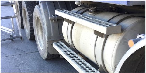 Powerwash team servicing a truck
