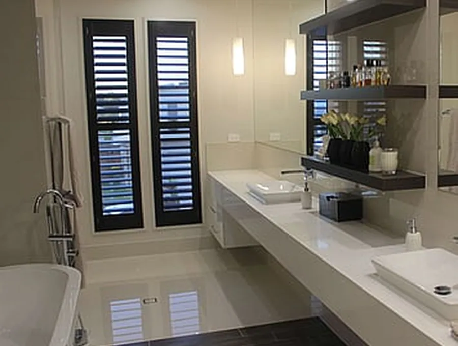 Precision Pipeline finished bathroom with feature shutters and floating vanity