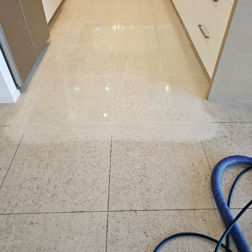 Hard floor being cleaned