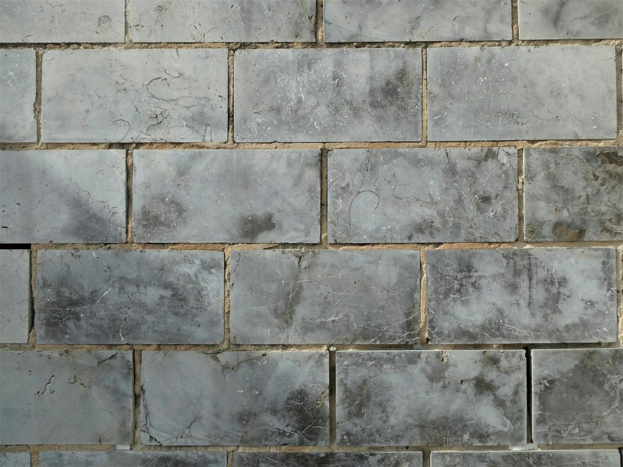 Close-up of grey stone floor tiling