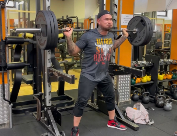 Squatting — strength and fitness training