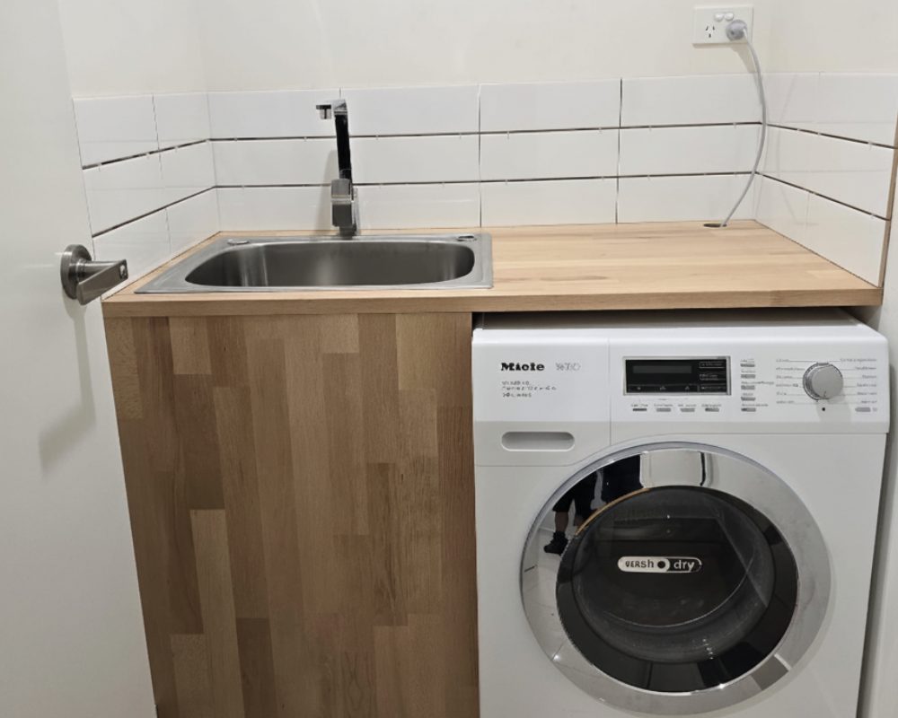 Laundry with new benchtop and splashback