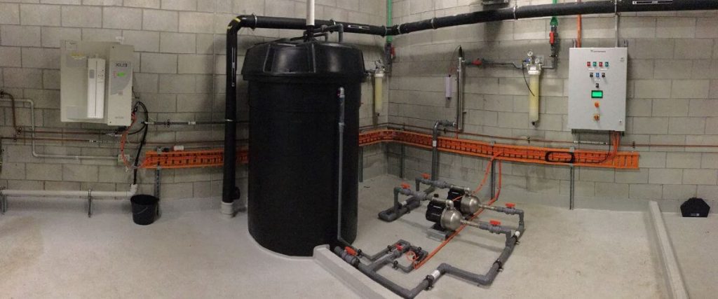 plumber carrying out preventative plumbing maintenance in Brisbane commercial property