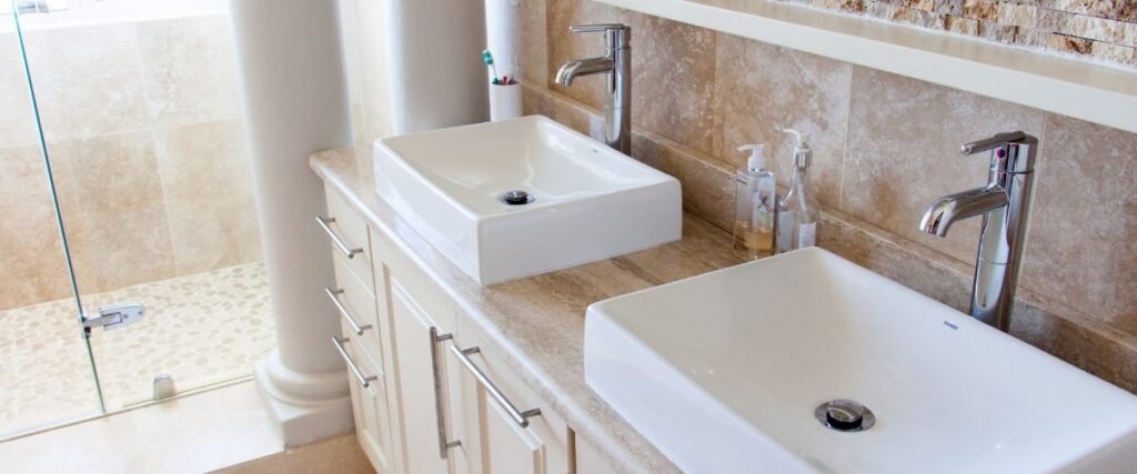 plumber installing new piping and taps for kitchen in Ashgrove